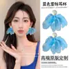 Aretes de gasa azul con ambiente súper de hadas junto al mar, aretes de alta gama, temperamento gentil, diseño de nicho, aretes estilo vacacional