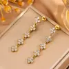 Pulseira de Trevo de Quatro Folhas com Pedras Totais de Alta Versão Moda Transfronteiriça para Meninas, Luxo Acessível e Pulseira de Flor de Aço Titânio Estilo Ins de Alta Qualidade