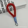 Nova Alça de Celular Curta de Pelúcia Criativa para Outono e Inverno, Pulseira de Pulso Premium da Moda, Chaveiro de Celular com Fivela Única, Alça Anti-Queda