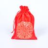 Bolsita de la suerte pequeña de año nuevo con cordón sobre rojo bolsa de embalaje para joyería festival de primavera banquete de boda regalo bolsa de dulces al por mayor