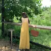 Vestido de tirantes amarillo atmosférico sin espalda estilo francés para mujer, vestido largo de encaje estilo resort de verano
