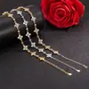 Bestseller Douyin Exclusiva Pulseira de Trevo de Quatro Folhas Feminina Design de Nicho Ins Luxo Leve Alta Qualidade Zircônia Estrelada Anel de Mão Joia