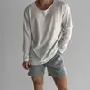 Camiseta de punto ligera y transpirable con protección solar de manga larga para hombre, estilo americano primavera/verano, casual y de corte holgado