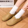 Zapatos de primavera y otoño de color sólido de media caña con altura de resorte, tubo corto, estilo japonés, para estudiantes, estilo coreano, suela plana, estilo preppy