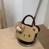 Bolso de mano lindo de oso estilo coreano, bolso de hombro versátil y simple para mujer, nuevo modelo de bolso 2026, bolso cruzado único
