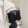 Bolso de Hombro Simple Nuevo y de Moda 2026 Primavera Diseño de Nicho Personalidad Casual Bolso Cuadrado Pequeño Bolso Cruzado para Mujer