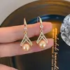Pendientes de flor de perla coreanos estilo TikTok para mujer, lujo ligero, alta gama, nicho, versátiles, elegantes, populares