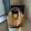 Bolso de axila tejido de PU de alta gama para mujer, nuevo bolso de axila de moda para otoño/invierno 2026, bolso tote para ir al trabajo