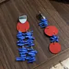 Pendientes de Borla de Disco de Cuero Rojo y Azul Contrastantes con Personalidad Exagerada Moda Europea y Americana Pendientes Asimétricos de Gama Alta para Mujer