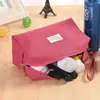 Bolsa de maquillaje de mano de tela Oxford para mujer, bolsa cuadrada pequeña simple, bolsa de almacenamiento de cosméticos portátil de gran capacidad, venta al por mayor, se puede imprimir con texto