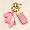 Consigue inmediatamente llavero colgante de dinero personalidad creativa colgante de cuero exquisito para hombres y mujeres pareja bolsa llavero de coche