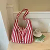Bolsa de rayas de gran capacidad 2026 nuevo bolso tote de moda de verano ins para estudiante universitario bolso de mano para clase