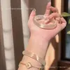 Pulseira Olho de Gato Dourado Champagne, Joia de Gelatina Lichia Lua Branca, Pulseira de Jade Popular em Transmissão Ao Vivo Tiktok e Kuaishou, Atacado de Fábrica