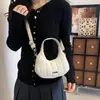 Bolsa Meia-Lua Jeans Acolchoada Única para Mulheres 2026 Nova Tendência Retro Bolsa de Ombro Transversal Bolsa de Mão Fashion Versátil