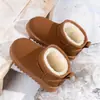 Botas de nieve para niños y niñas 2026 nuevos zapatos de algodón cálido de felpa de invierno zapatos de bebé botas cortas impermeables para niñas