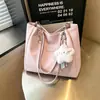 Bolsa feminina de grande capacidade para uso transfronteiriço, nova coleção outono 2026, bolsa de ombro versátil e elegante, bolsa tote moderna e casual para o trabalho e uso diário
