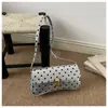 Tendência de Bolinhas Feminino 2026 Nova Elegante Grande Capacidade Fashionable Textura de Cadeado Retrô Bolsa de Ombro Casual para Mulheres