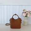 Bolso cruzado versátil de nicho coreano de moda para mujer, bolso tipo cubo casual a la moda, bolso de mano simple