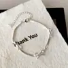 Estilo Nicho Transfronterizo Europeo y Americano, Diseño Simple y Elegante, Pulsera de Cadena de Serpiente con Lazo, Lujo Ligero, Sensación de Alta Gama, Accesorio de Mano Versátil para Mujer
