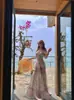 Top de tubo floral corto sin hombros de estilo dulce para vacaciones para mujer, impresionante conjunto de falda larga de verano