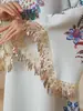 SW2613 Superventas transfronterizo, vestido largo de lujo ligero con borlas, cuello en V, adornos florales de pedrería de alta resistencia, mangas de campana y diseño estampado