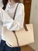 Bolsa tejida de gran capacidad, nuevo diseño de verano 2026, bolso de hombro o axila de color liso estilo vintage, bolso de mano tipo tote estilo coreano