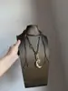 Colar Pingente Lua Dourada Estrela de Oito Pontas Design de Nicho Corrente Longa para Suéter Moda Retrô Colar Personalizado para Mulheres