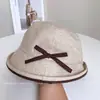 Chapéu de Pescador com Laço de Bolinhas Japonês e Coreano Chapéu de Bacia Retro de Verão Respirável com Proteção Solar Feminino Chapéu de Sol Versátil Elegante