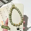 Cordão para Celular Raiz de Bodhi Verde Degradê com Delicado Pingente de Lírio-do-Vale, Corrente Anti-Perda para Celular para Meninas, Acessório Versátil para Bolsa