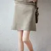 Falda Corta de Punto de Lana Pura Gruesa de Siete Puntos Estilo Nuevo Invierno 2026 para Mujer, Color Sólido, Dobladillo Rizado, Línea A