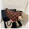 Bolso croissant de lunares de nicho estilo coreano transfronterizo para mujer, nuevo bolso tipo dumpling vintage chic, bolso de hombro y bandolera a la moda, moderno