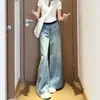 Jeans retro de pierna ancha en azul claro para mujer, nueva colección de otoño, talla grande, tiro alto, adelgazantes, corte holgado y largos hasta el suelo