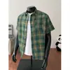 Camisa Xadrez de Manga Curta Masculina Top Transfronteiriça 26 Verão Nova Estilo Americano Jovem Camisa de Manga Curta Jaqueta Solta para Homens