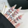 Estilo Medieval Tardío Elegante Dulce Fresco Blanco Esmalte de Goteo Mariposa Saturno Anillo de Moda Anillo Geométrico Simple de Personalidad de Nicho para Mujeres