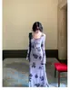 Vestido largo elegante vintage francés morado floral estilo Hong Kong impresionante nuevo vestido de malla estampada otoño 2026