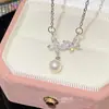 Colar com Pingente de Zircônia e Pérola Borboleta Doce e Requintado para Mulheres, Corrente para Clavícula Estilo Luxo Leve de Verão Atacado