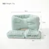 Conjunto popular de quatro peças: escova de lavar o rosto de silicone, faixa de cabelo, pulseira de pulso, escova de massagem facial de silicone, ferramenta de beleza com cerdas macias
