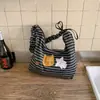 2026 Nueva Moda Coreana Versátil de Nicho Bolso de Lona Rayado para Viajar, Gran Capacidad Bolso de Hombro Cruzado