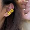 Dongju 2023 amarelo smiley face orelha clipe sem piercing osso da orelha clipe bonito estilo japonês all-match doce legal brincos Coreia do Sul
