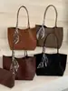 Bolso tote de gamuza minimalista y sofisticado transfronterizo para mujer, nueva colección otoño/invierno 2026, gran capacidad, adecuado para ir al trabajo, bolso de hombro y se puede llevar bajo el brazo.