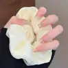 Unhas Usáveis Estilo Desejo Puro Ins Cor Nude Cauda de Peixe Pérola Nail Art de Luxo Leve Peças de Unha Produto Acabado 2026 Novos Adesivos de Unha