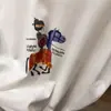 Camiseta de Manga Longa de Algodão Puro com Gola Redonda, Padrão de Desenho Animado com Letras, Corte Solto, Estilo Coreano Novo, Primavera e Outono de 2026 para Mulheres, Camiseta Básica Tendência