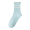Calcetines de otoño e invierno para mujer Zhuji, de media pantorrilla, cálidos, nuevos, de moda, para influencer deportiva, calcetines negros de tubo largo holgados