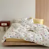 Nuevo modelo 2026 Clase A grado maternidad 100% algodón puro juego de ropa de cama de cuatro piezas con funda de edredón de lunares de colores, fresco y elegante