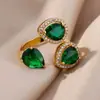 Europa y Estados Unidos transfronterizo exquisito anillo de flor con incrustaciones de circón verde para mujer 2025 nuevo anillo retro de alta calidad al por mayor