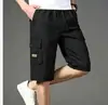 Bermuda de Trabalho Masculina de Verão, Calça Casual de Cinco Pontos Solta Tendência Estilo Japonês, Algodão Puro, Respirável, Secagem Rápida, Design com Vários Bolsos