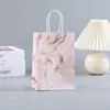 Bolsa de presente de papel Kraft nova e criativa transfronteiriça bolsa de presente com areia movediça e marmorizado bolsa de armazenamento criativa portátil