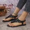 Comercio Exterior Tallas Grandes Verano 2026 Nuevas Sandalias Mujer Anillo en el Dedo del Pie de Flor Europea Americana Sandalias Planas Chanclas Zapatos de Playa