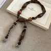 Colar Pingente Estrela de Resina Vintage com Contas de Algodão e Linho Corrente para Clavícula Estilo Étnico Corrente para Suéter Design de Nicho