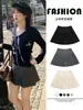 Falda plisada de lana gris para mujer, nuevo estilo otoño 2026, falda de línea A de cintura alta para figuras petite, falda de punto miu
